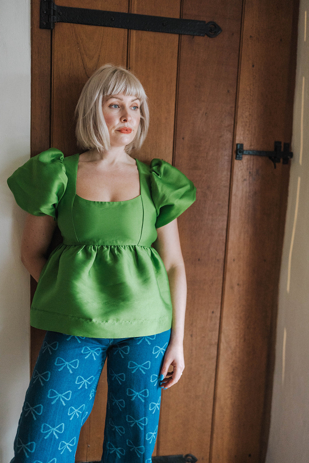 Aligne Green Allanah Puff Sleeve Satin Top worn on model 