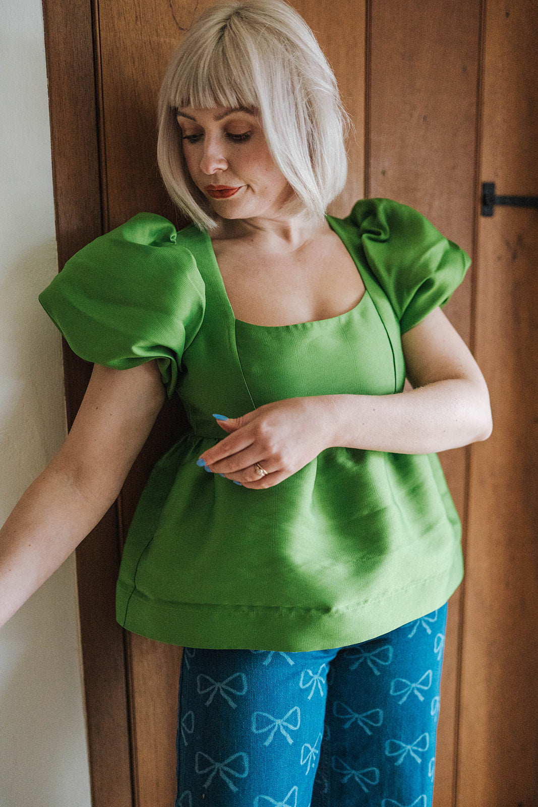 Aligne Green Allanah Puff Sleeve Satin Top worn on model 