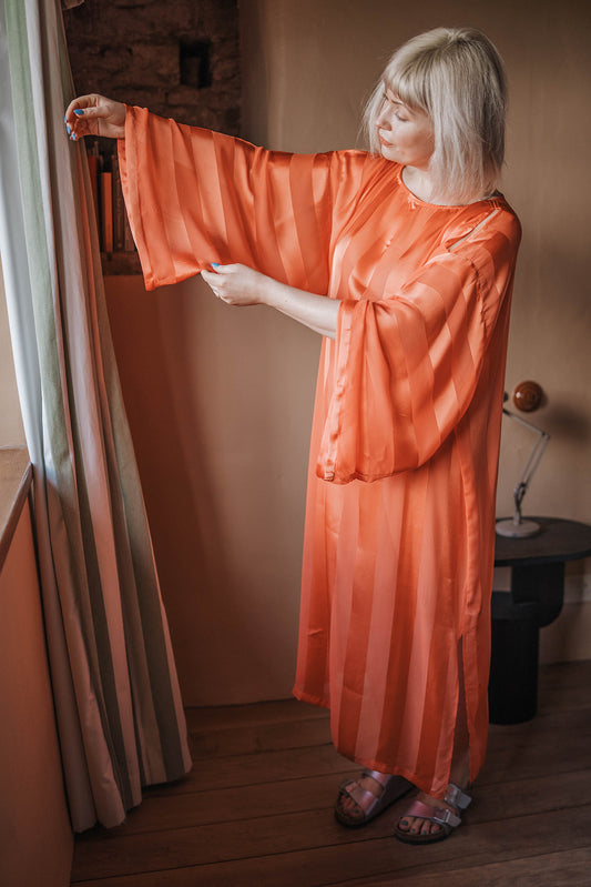 Anthropologie Orange Stripe Silk Kaftan worn on model 