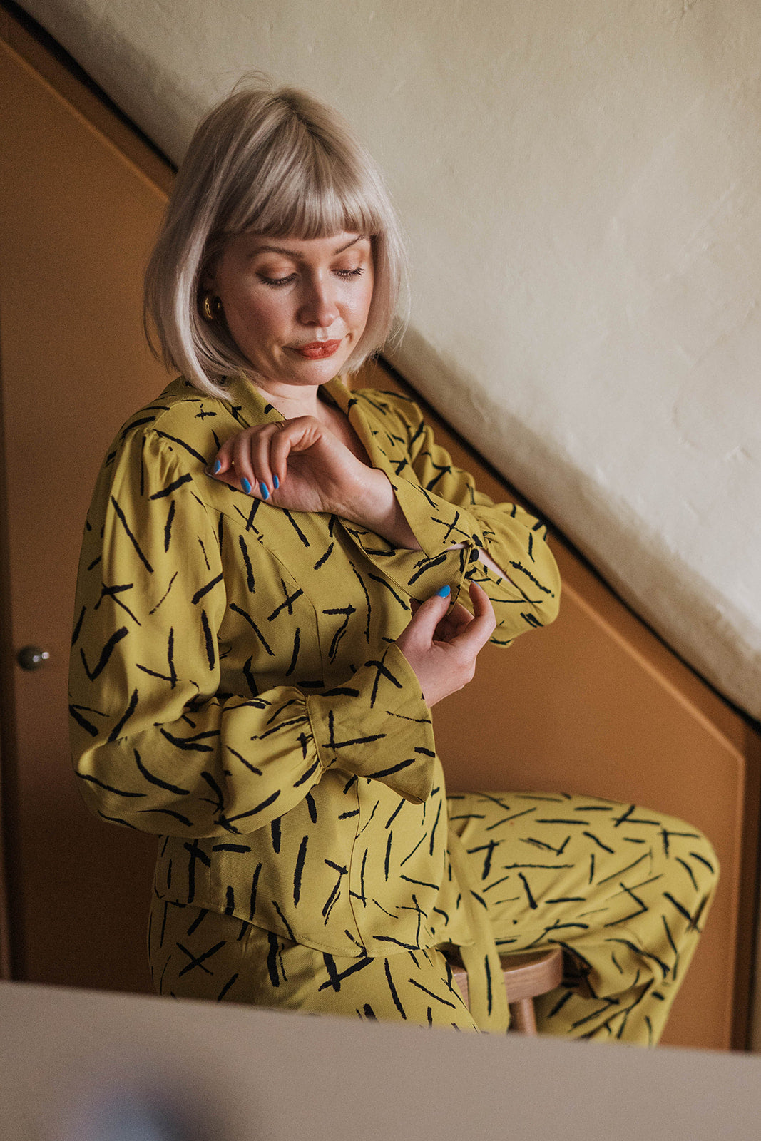 Finery Citrus Dash Trouser Suit worn on seated model 