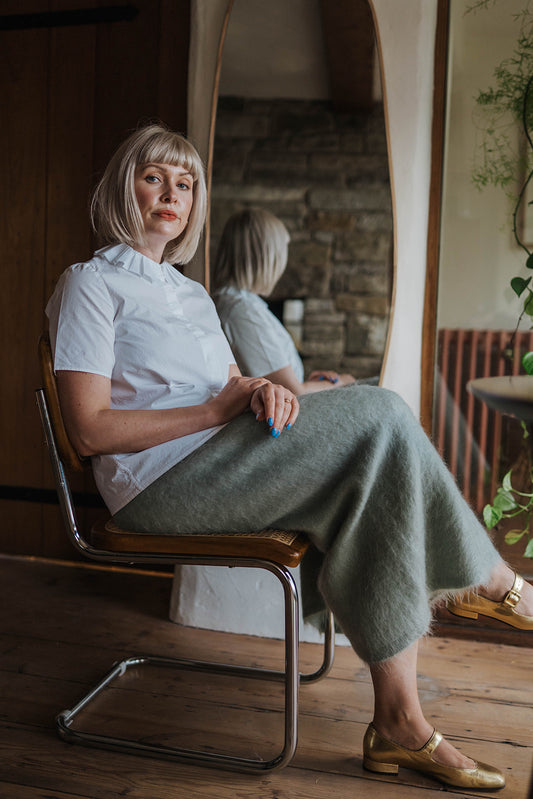 & Other Stories Mint Green Mohair Midi Skirt worn on seated model 